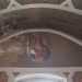 Dando le spalle allaltare possiamo poi notare la rappresentazione di Cristo. Si trova allinterno di unellissi e compie i gesti rituali dellUltima cena